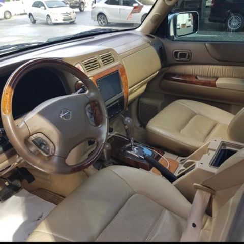 Brown Steering Wheel with Brown Wood Super Safari Nissan Patrol Y61 VTC GU