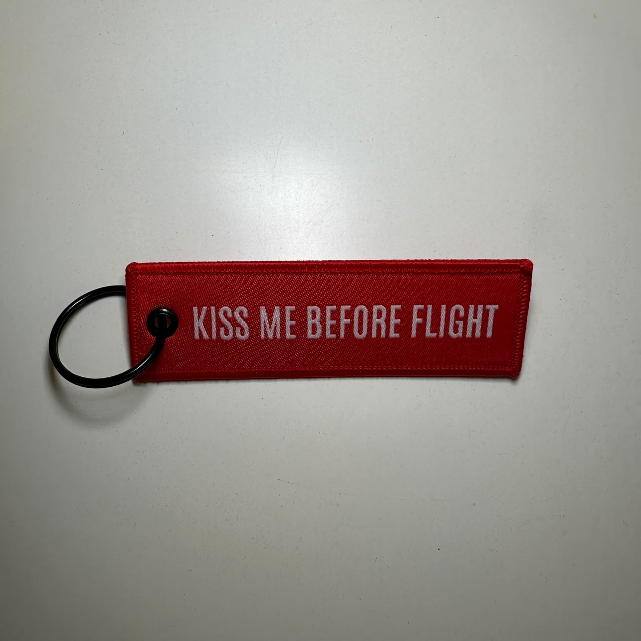 Kiss Me Before Flight Red Key Chain