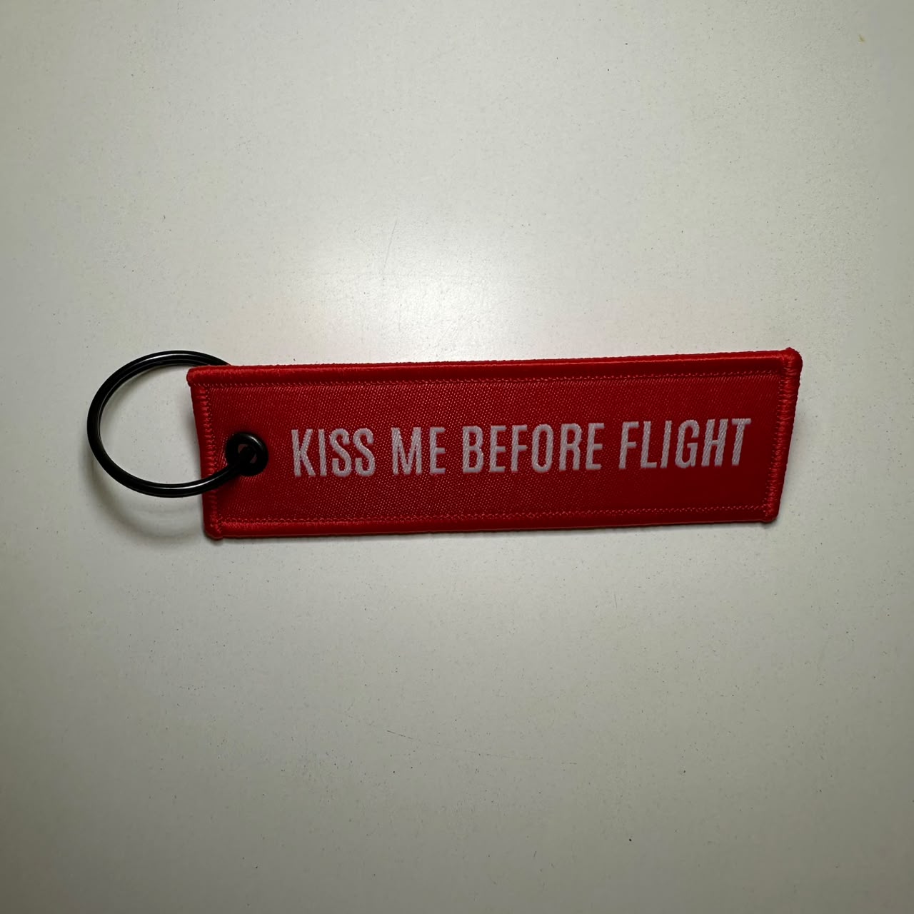 Kiss Me Before Flight Red Key Chain