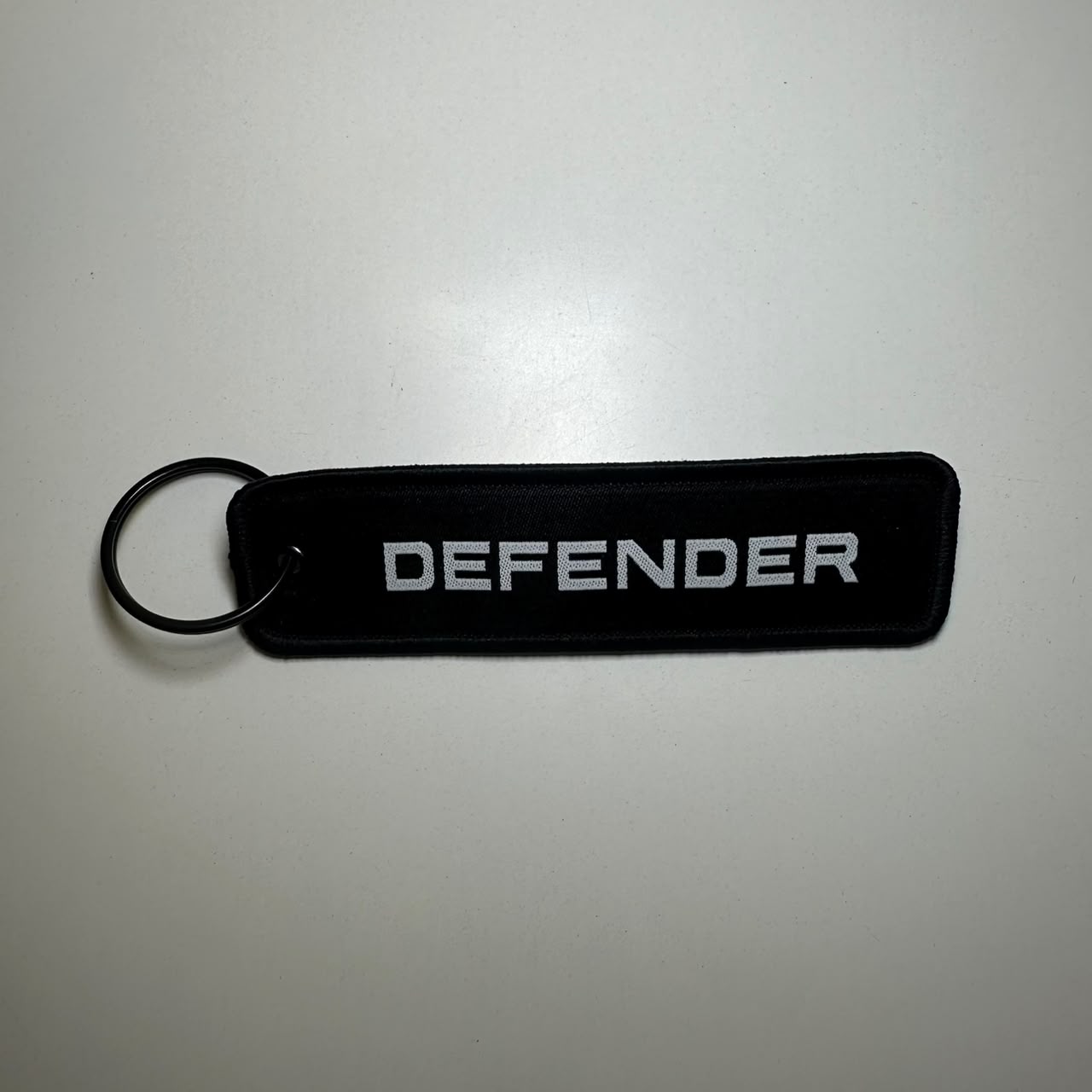 Defender Black Key Chain