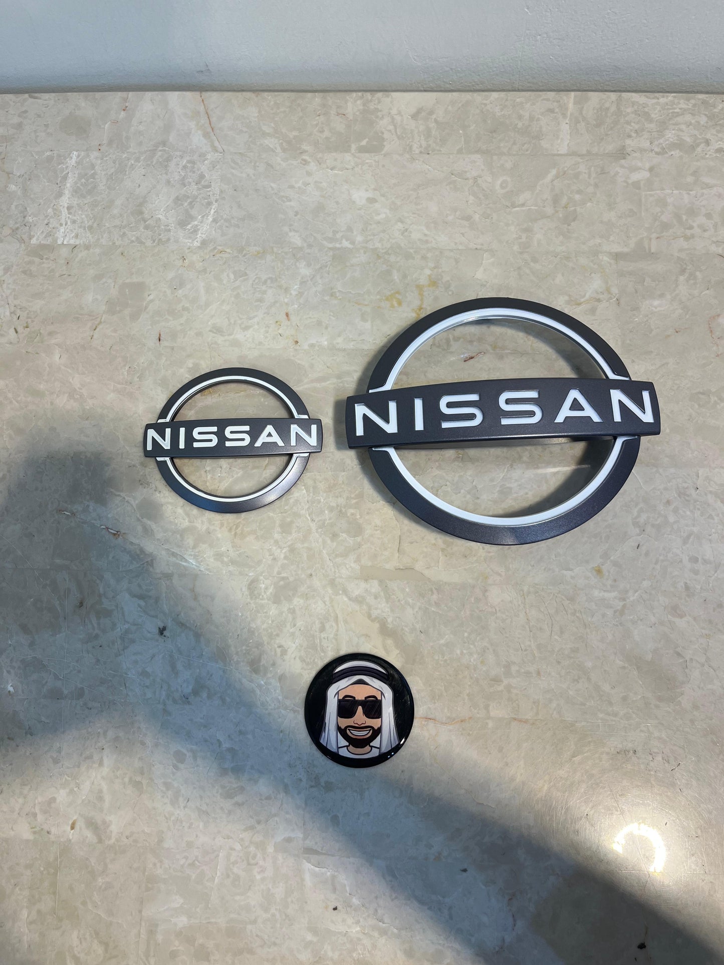 Front and Rear New Nissan Logo Set - Patrol Y62